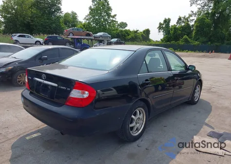 2003 Toyota Camry Xle z USA, uszkodzony, nr VIN 4T1BE30KX3U197331